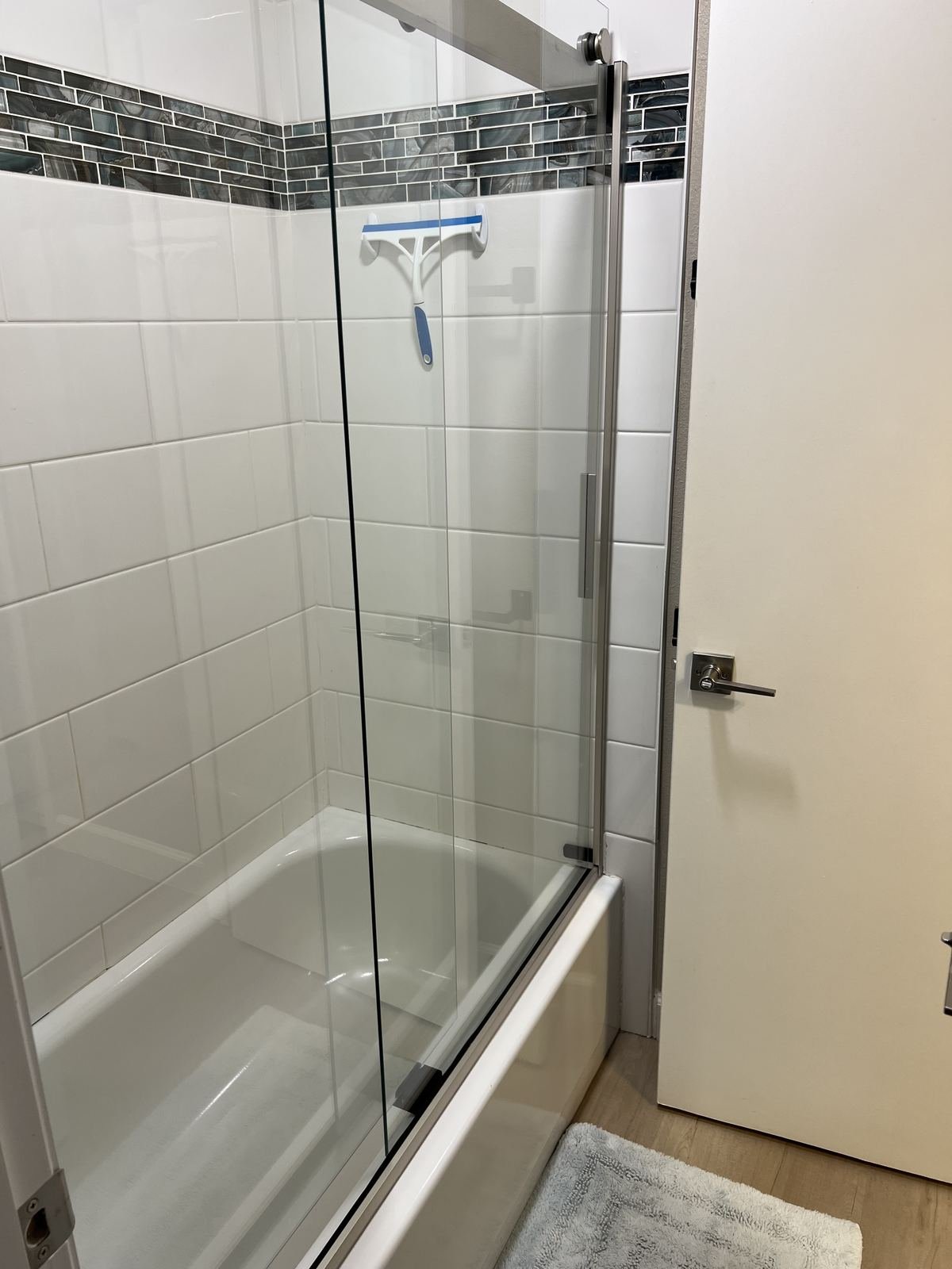 Tub shower with mosaic tile
